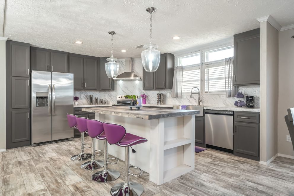 The STELLA Kitchen. This Manufactured Mobile Home features 3 bedrooms and 2 baths.