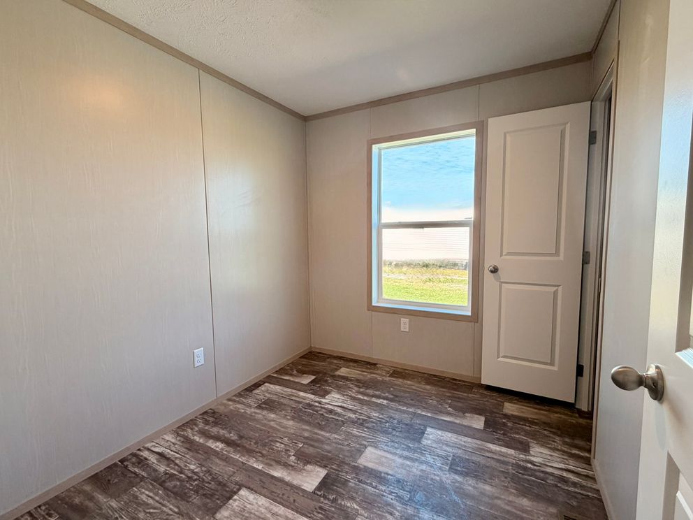 The JEFFERSON Guest Bedroom. This Manufactured Mobile Home features 3 bedrooms and 2 baths.