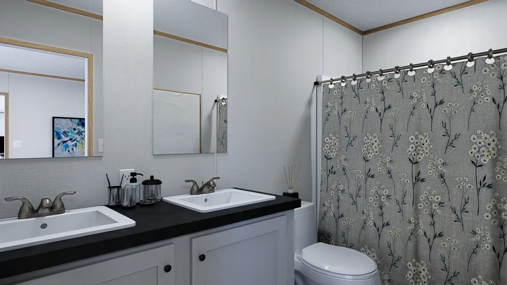The HORIZON ATLAS 16602A Primary Bathroom. This Manufactured Mobile Home features 2 bedrooms and 2 baths.