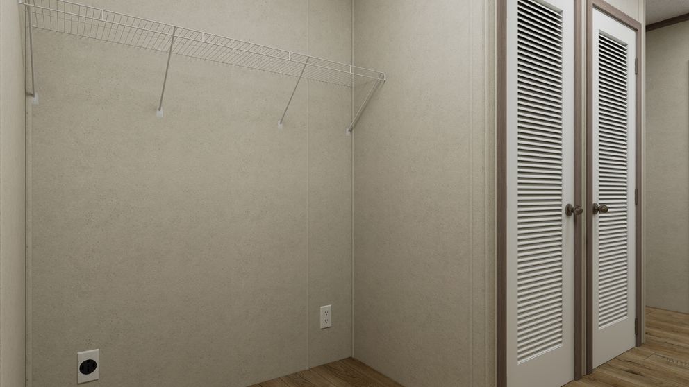 The 6016-CC03 HARBORVIEW 60 Utility Room. This Manufactured Mobile Home features 2 bedrooms and 2 baths.