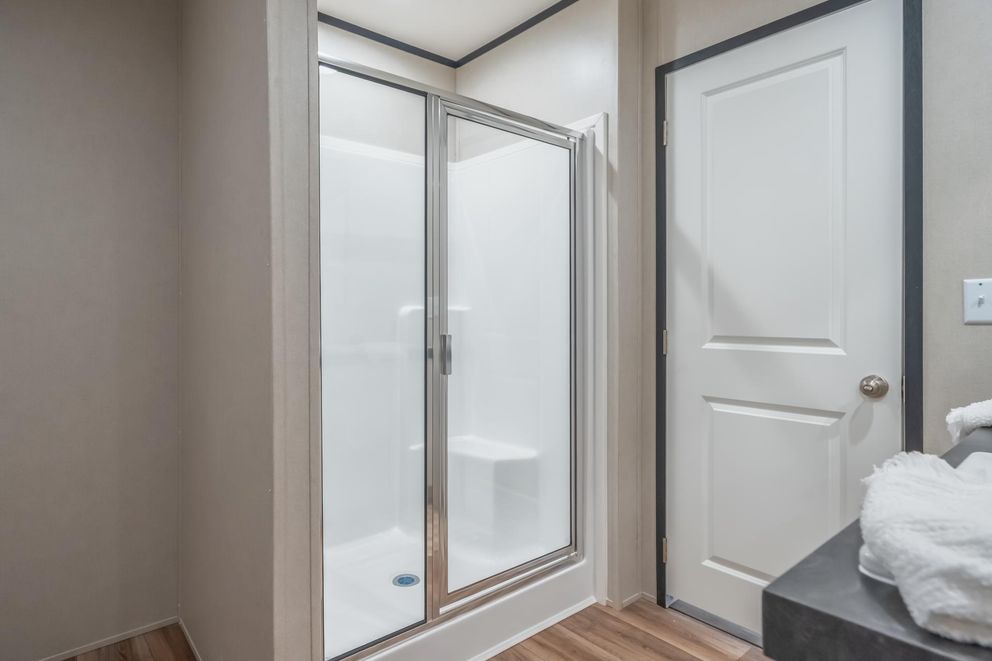 The ELEMENT Primary Bathroom. This Manufactured Mobile Home features 3 bedrooms and 2 baths.