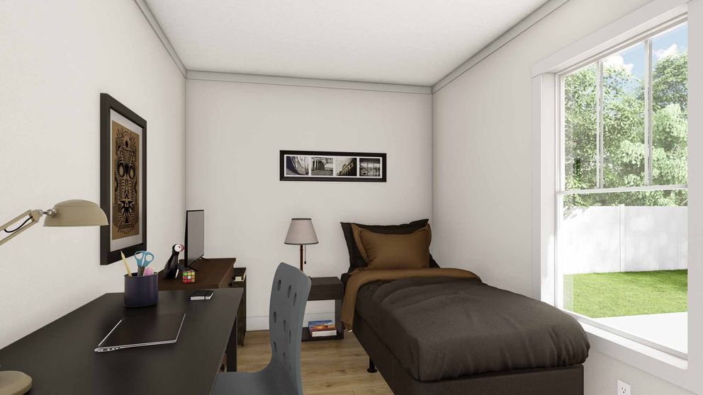 The RHYTHM NATION Guest Bedroom. This Manufactured Mobile Home features 3 bedrooms and 2 baths.