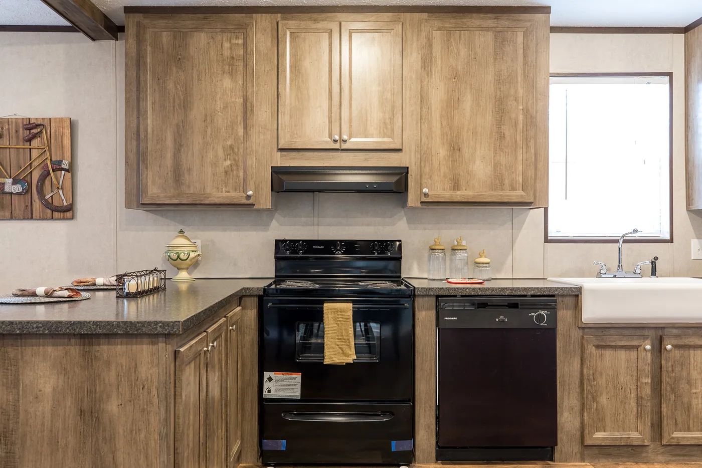 The THE ANNIVERSARY Kitchen. This Manufactured Mobile Home features 3 bedrooms and 2 baths.