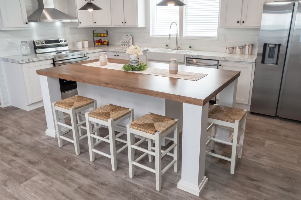 The ISLAND BREEZE Kitchen. This Manufactured Mobile Home features 3 bedrooms and 2 baths.
