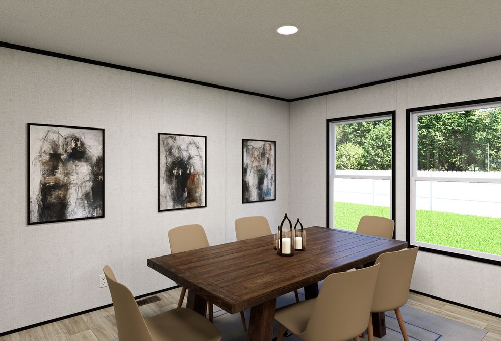 The ECLIPSE Dining Room. This Manufactured Mobile Home features 4 bedrooms and 2 baths.