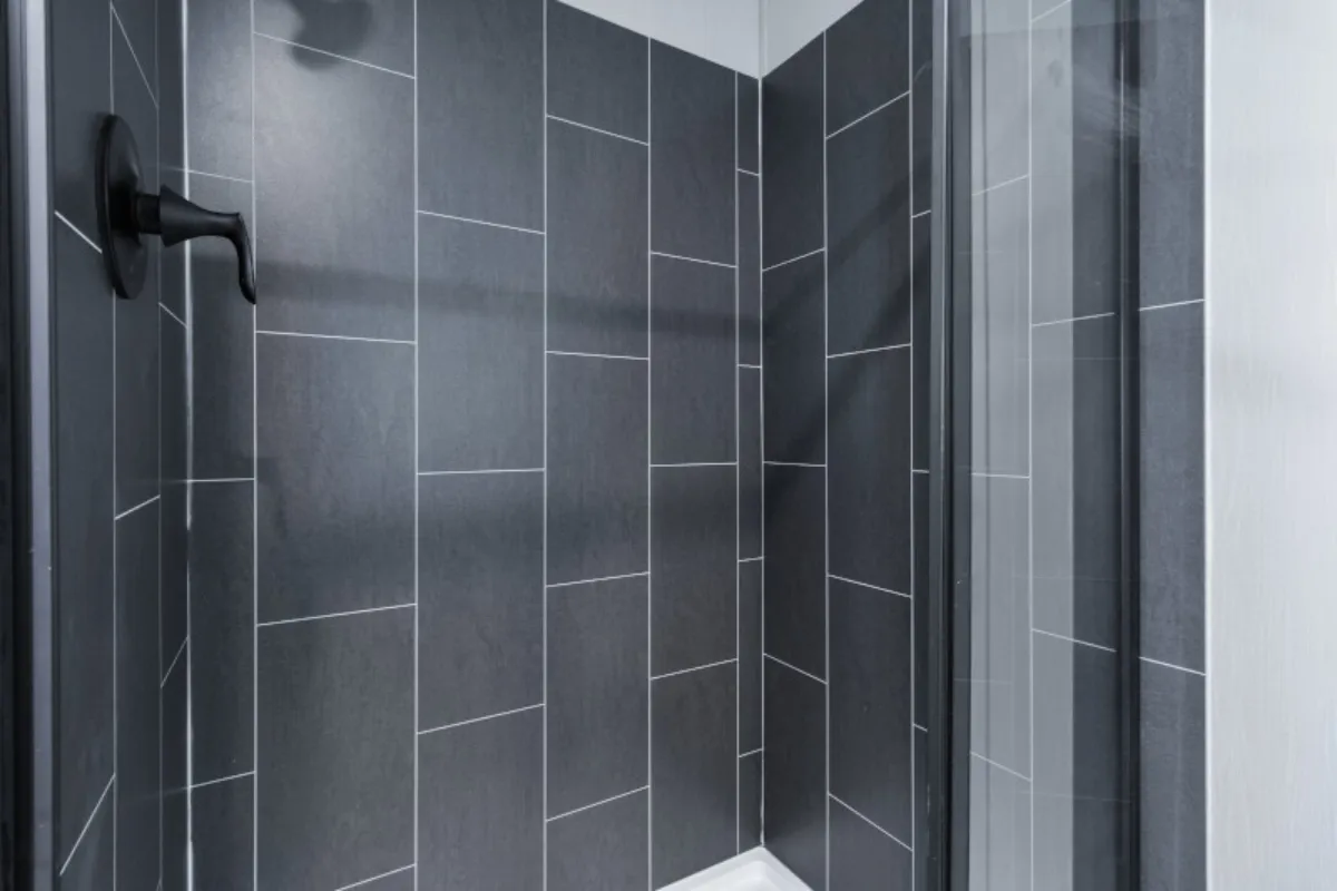 The ANNIVERSARY 16763S Primary Bathroom. This Manufactured Mobile Home features 3 bedrooms and 2 baths.