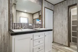The ANNIVERSARY SPLASH Primary Bathroom. This Manufactured Mobile Home features 3 bedrooms and 2 baths.