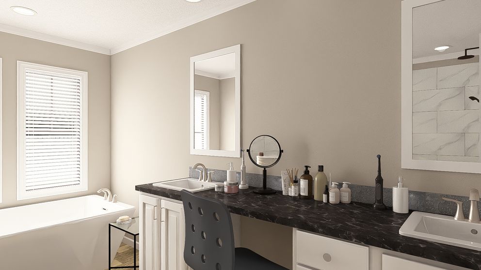 The THE BIG EASY Primary Bathroom. This Manufactured Mobile Home features 4 bedrooms and 3 baths.