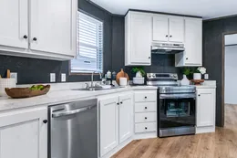 The SELECT 16723F Kitchen. This Manufactured Mobile Home features 3 bedrooms and 2 baths.