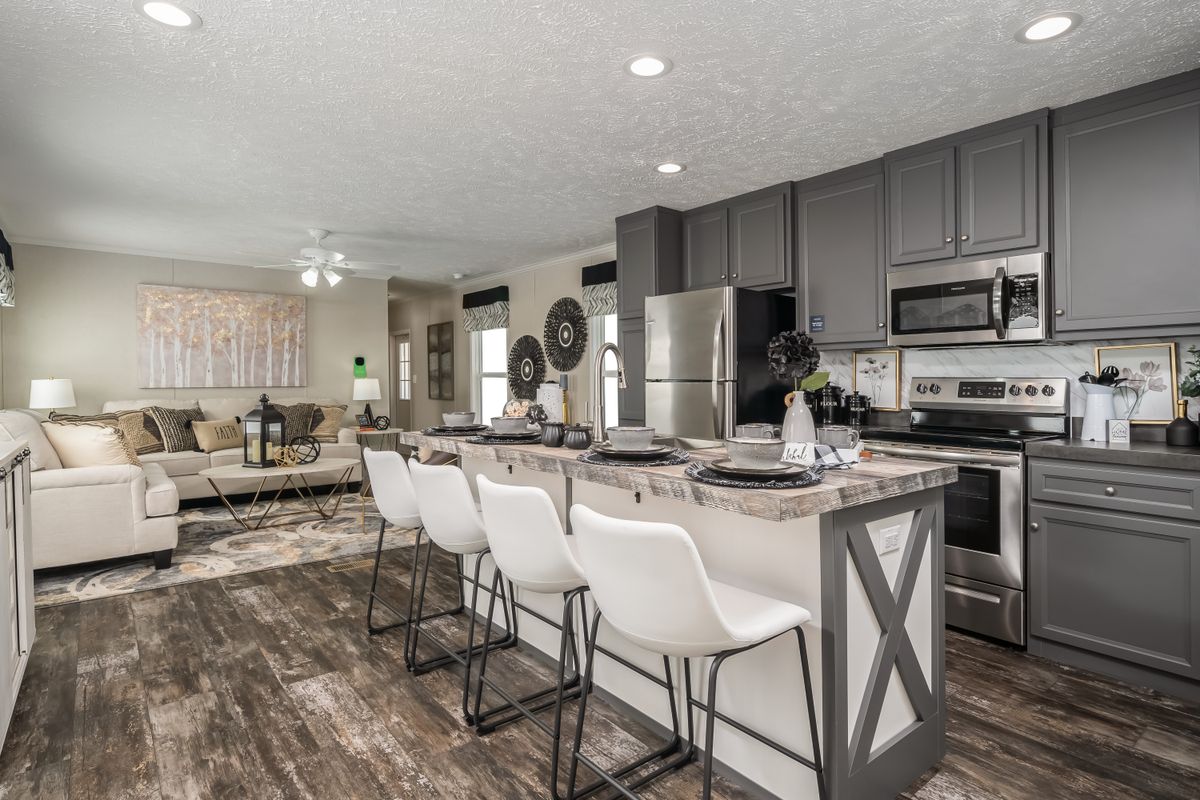 The RIVERVIEW Exterior. This Manufactured Mobile Home features 2 bedrooms and 2 baths.