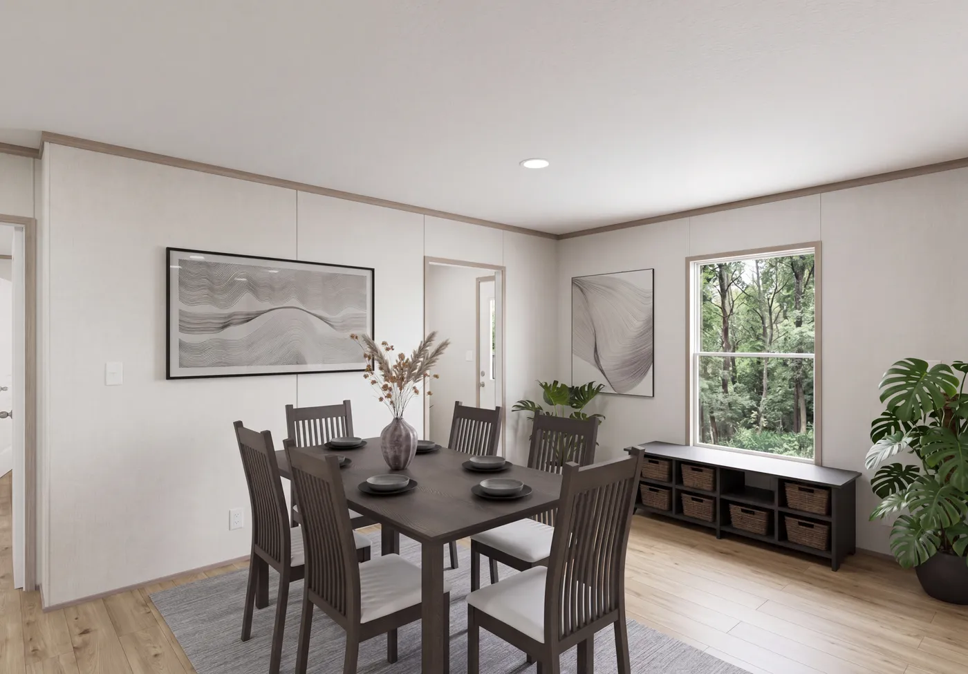 The THE MOUNTAINEER 64 Dining Area. This Manufactured Mobile Home features 3 bedrooms and 2 baths.