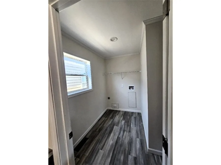 The SPINEL 64 Utility Room. This Manufactured Mobile Home features 3 bedrooms and 2 baths.
