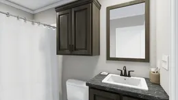 The THE LIL' EASY Guest Bathroom. This Manufactured Mobile Home features 3 bedrooms and 2 baths.
