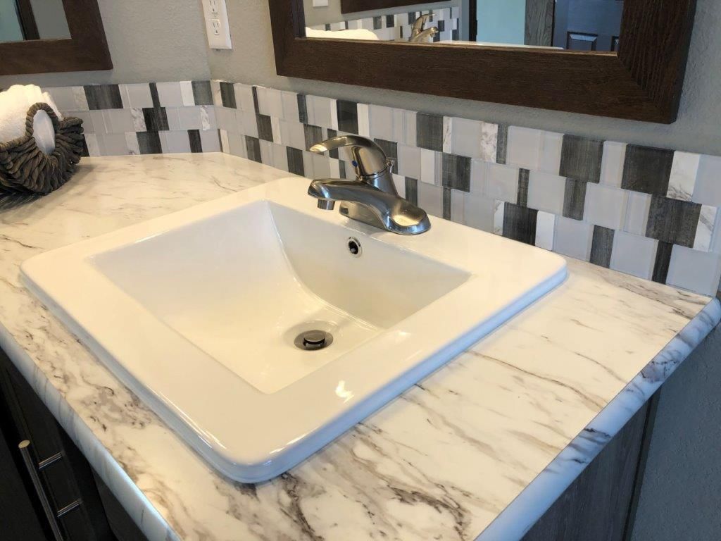 The LEGEND 572-1 MOD Guest Bathroom. This Modular Home features 3 bedrooms and 2 baths.