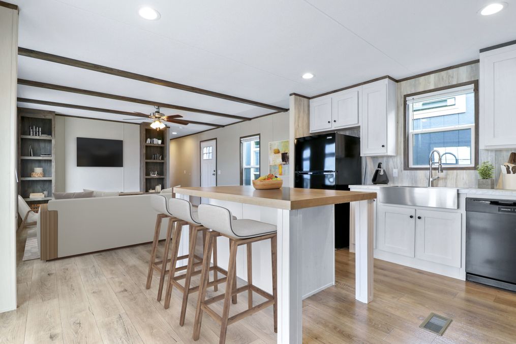 The ANNIVERSARY 16763I Kitchen. This Manufactured Mobile Home features 3 bedrooms and 2 baths.