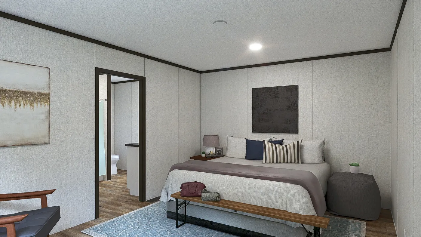 The ESSENCE Primary Bedroom. This Manufactured Mobile Home features 3 bedrooms and 2 baths.