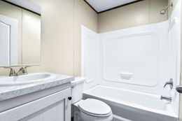 The ANNIVERSARY 16763I Guest Bathroom. This Manufactured Mobile Home features 3 bedrooms and 2 baths.