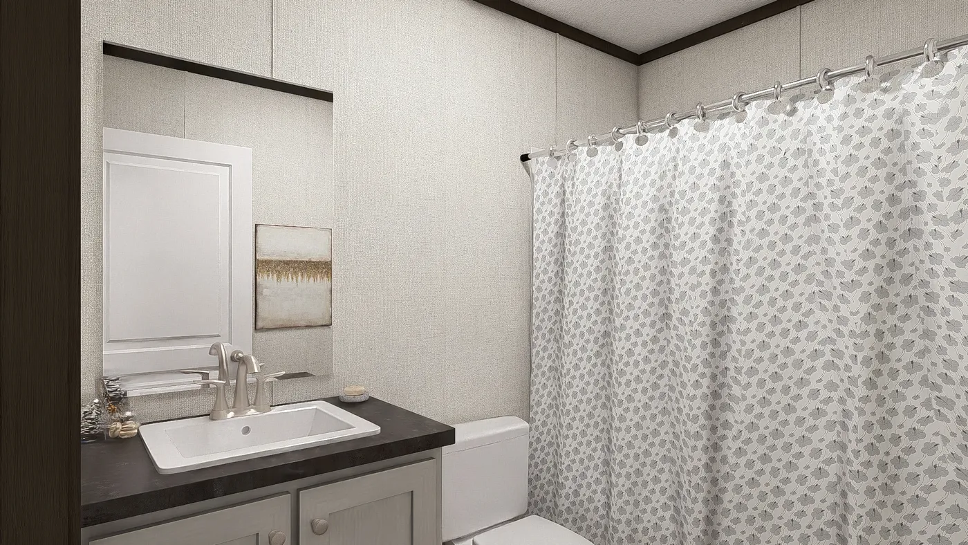 The DESIRE Guest Bathroom. This Manufactured Mobile Home features 3 bedrooms and 2 baths.