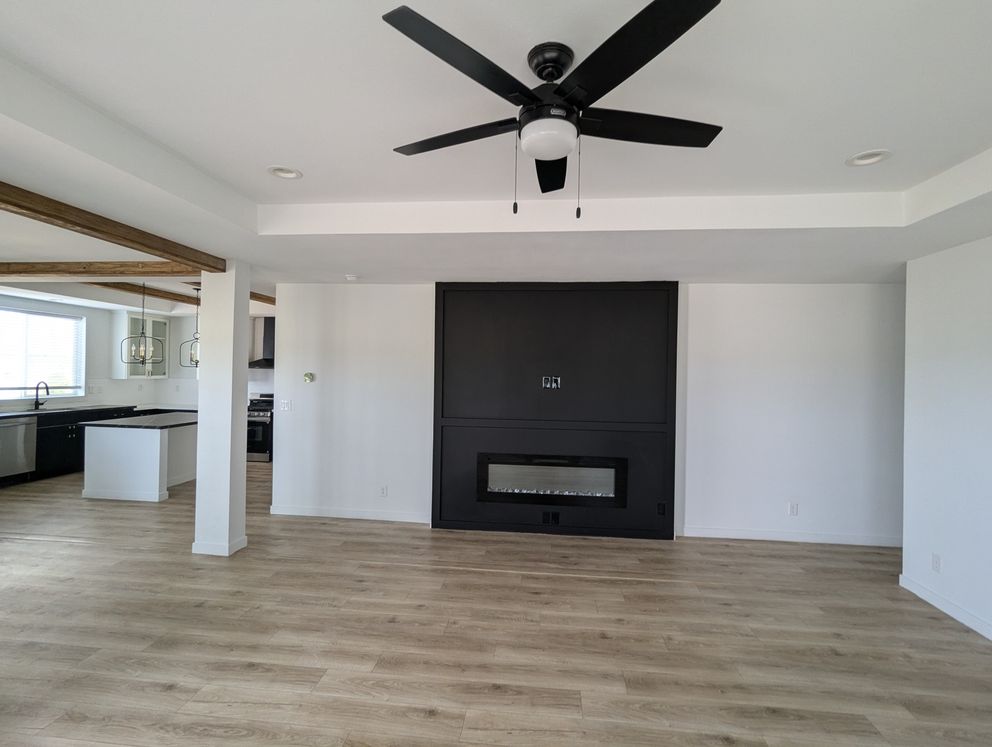 The LULAMAE 3 Living Room. This Manufactured Mobile Home features 3 bedrooms and 2 baths.