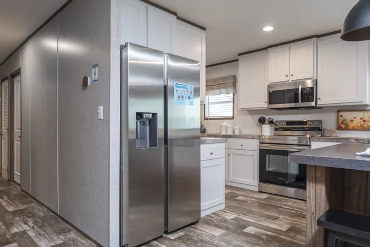 The LOCKLEAR Exterior. This Manufactured Mobile Home features 4 bedrooms and 2 baths.