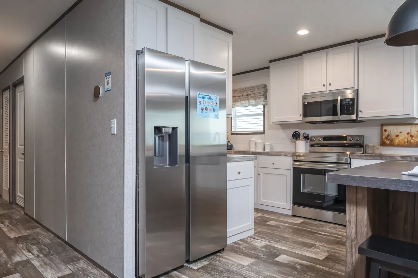 The LOCKLEAR Exterior. This Manufactured Mobile Home features 4 bedrooms and 2 baths.