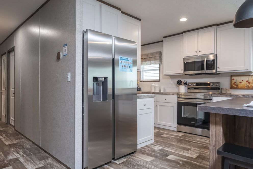 The LOCKLEAR Exterior. This Manufactured Mobile Home features 4 bedrooms and 2 baths.