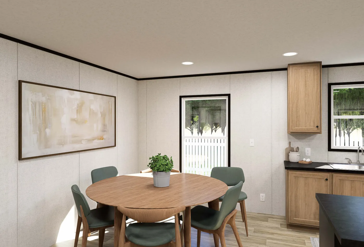 The DAWN Dining Area. This Manufactured Mobile Home features 3 bedrooms and 2 baths.