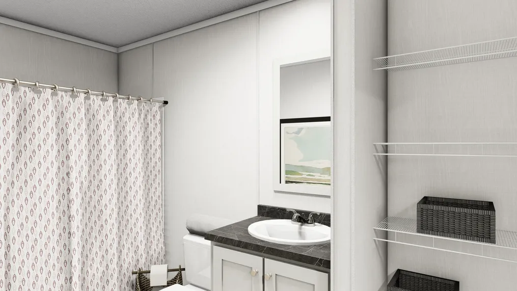 The TURQUOISE Primary Bathroom. This Manufactured Mobile Home features 2 bedrooms and 2 baths.