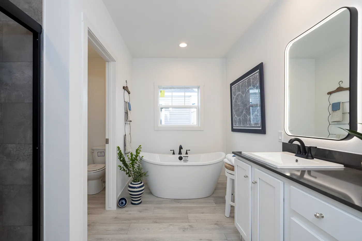 The WINSTON Primary Bathroom. This Manufactured Mobile Home features 3 bedrooms and 2 baths.