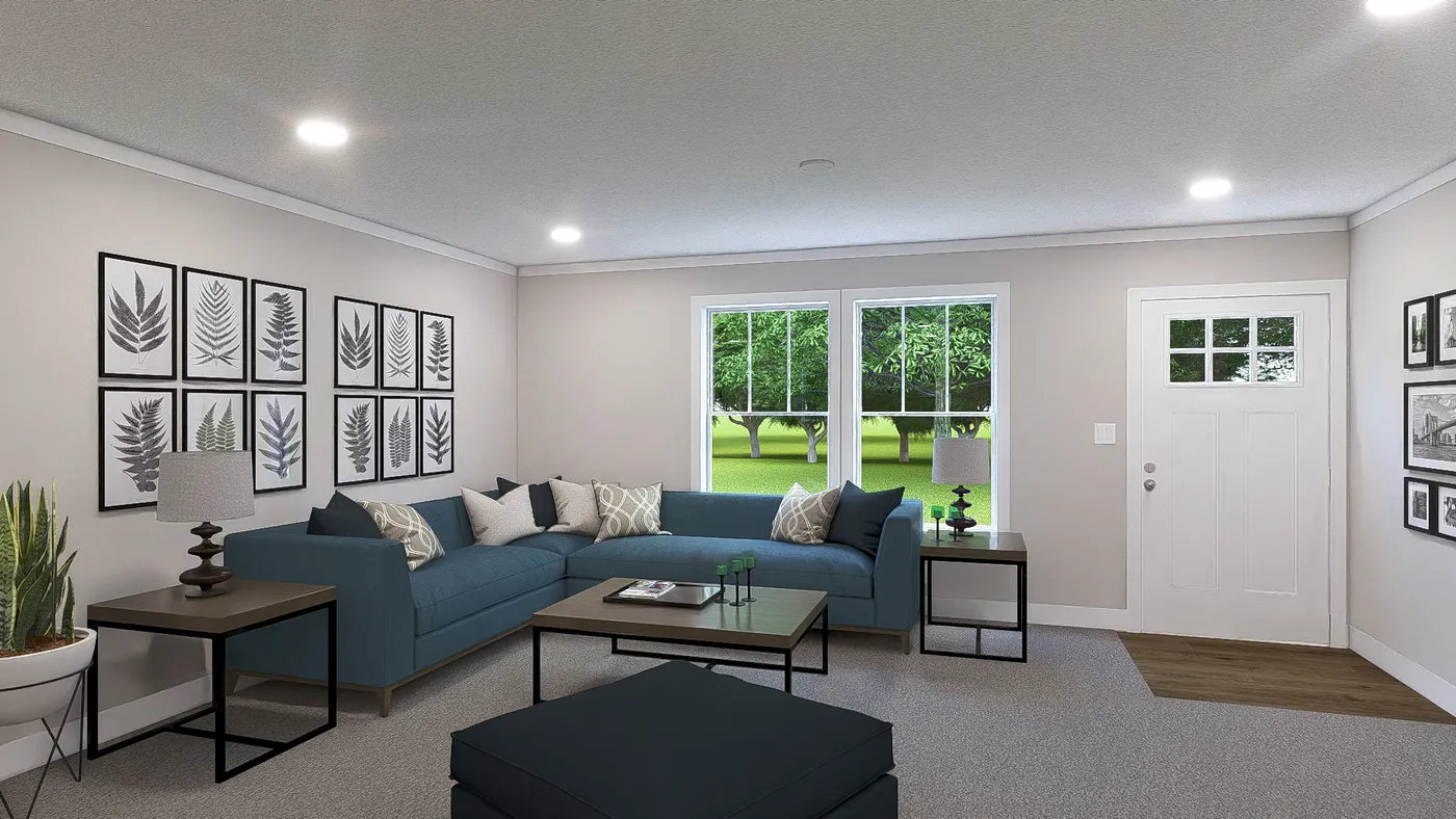 The LET IT BE Living Room. This Manufactured Mobile Home features 3 bedrooms and 2 baths.