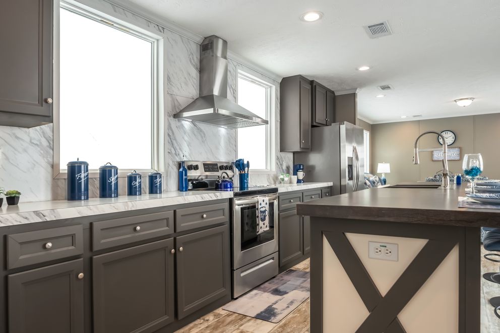 The MAJOR Kitchen. This Manufactured Mobile Home features 3 bedrooms and 2 baths.