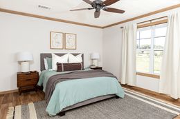 The ANGELINA Primary Bedroom. This Manufactured Mobile Home features 4 bedrooms and 2 baths.