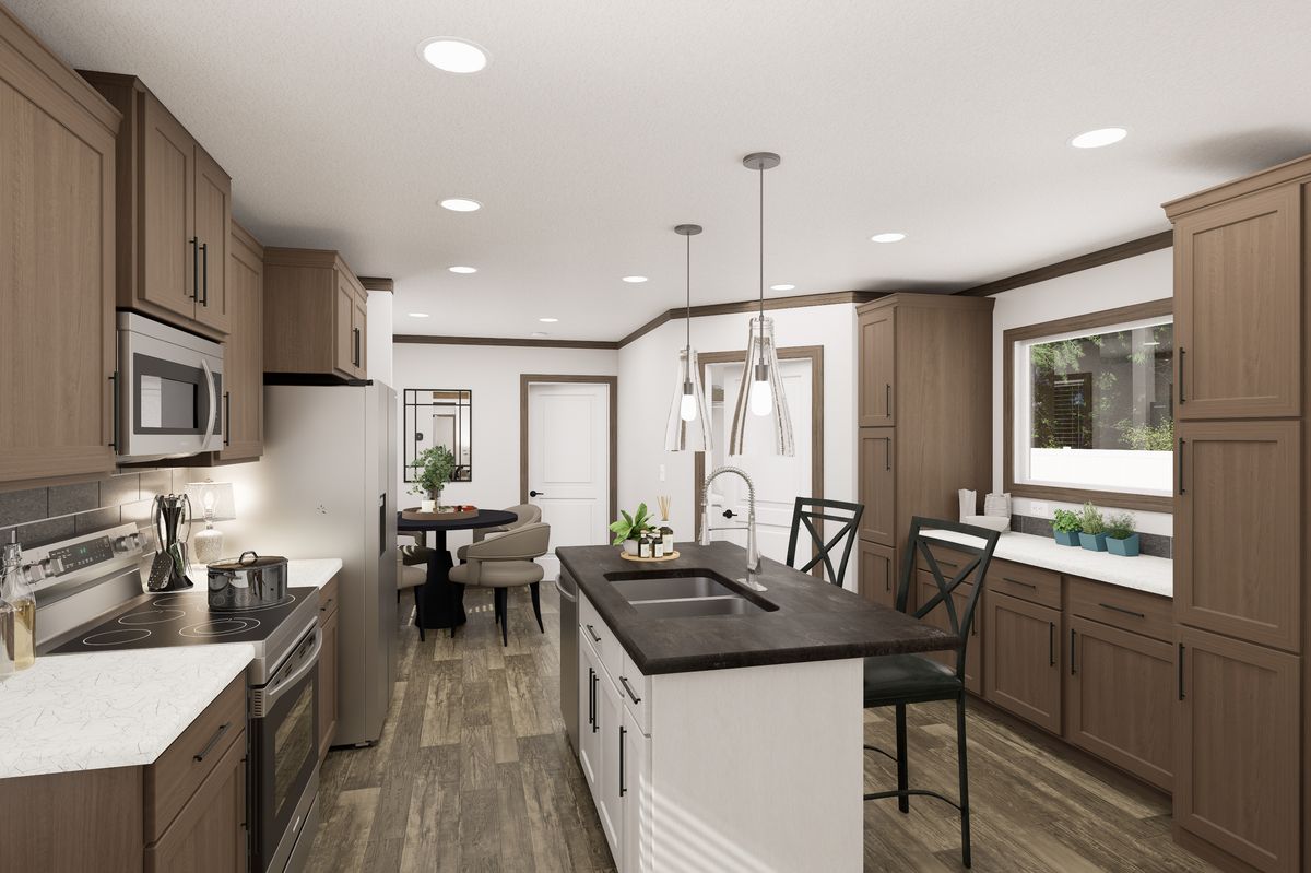 The THE TRUMAN Kitchen. This Manufactured Mobile Home features 3 bedrooms and 2 baths.