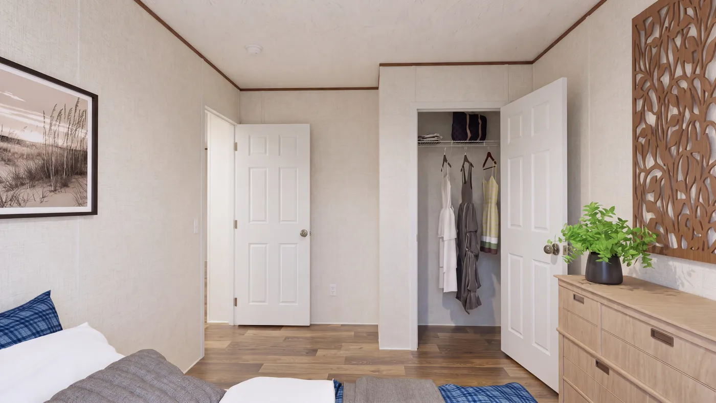 The CEDAR Guest Bedroom. This Manufactured Mobile Home features 3 bedrooms and 2 baths.