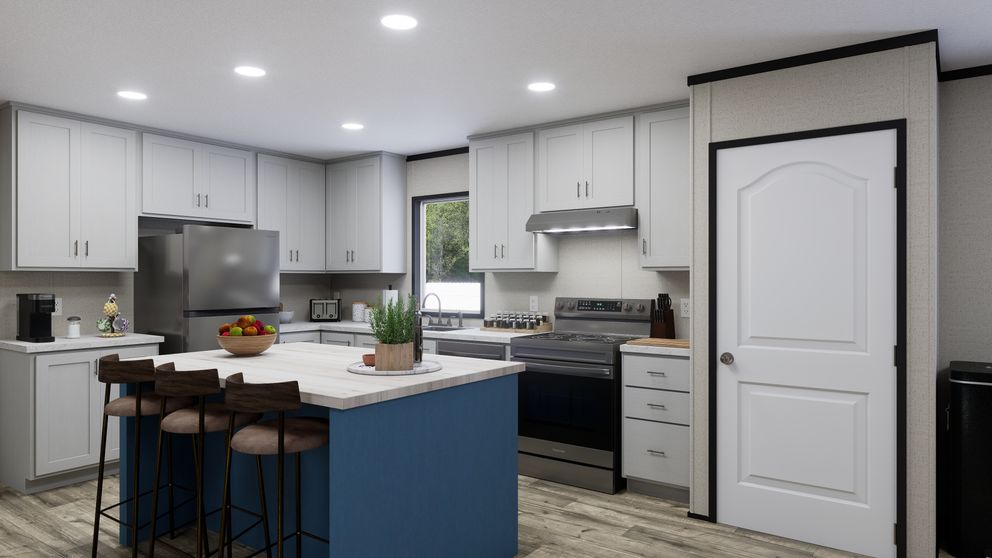 The THE MOUNTAINEER 52 Kitchen. This Manufactured Mobile Home features 3 bedrooms and 2 baths.