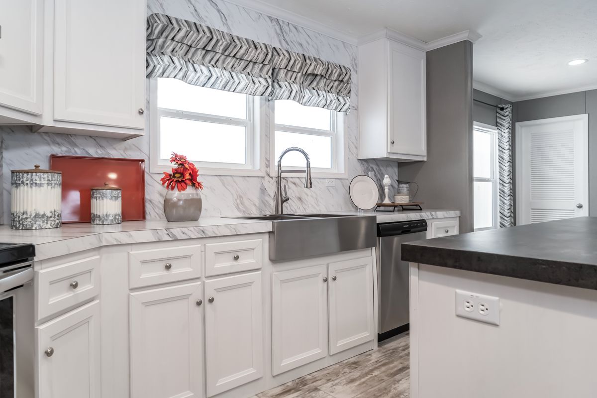 The CASCADE Kitchen. This Manufactured Mobile Home features 4 bedrooms and 2 baths.