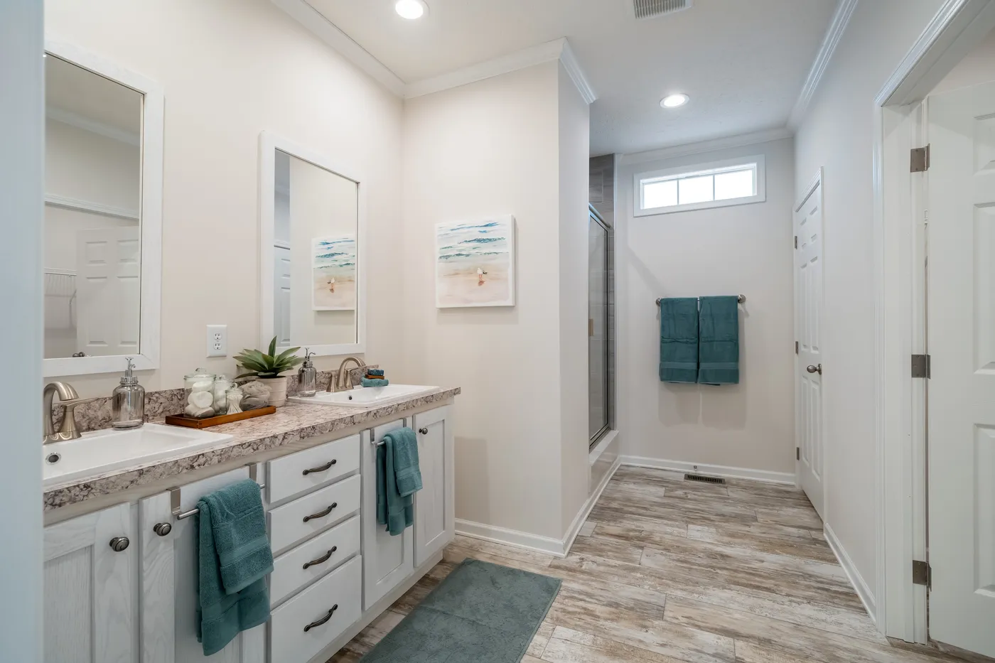 The 2889 THE COTTAGE MOD Primary Bathroom. This Modular Home features 3 bedrooms and 2 baths.