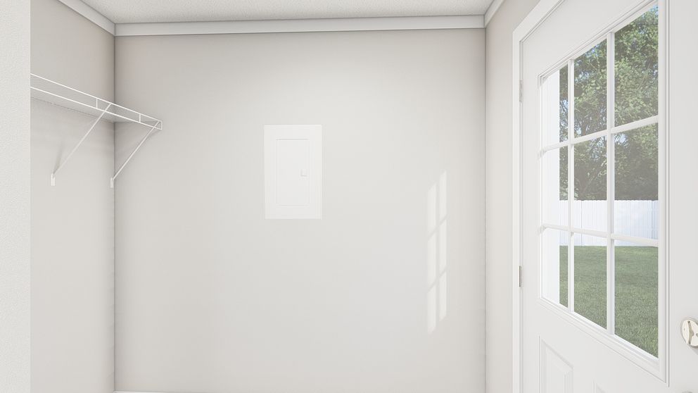 The MOVE ON UP Utility Room. This Manufactured Mobile Home features 3 bedrooms and 2 baths.