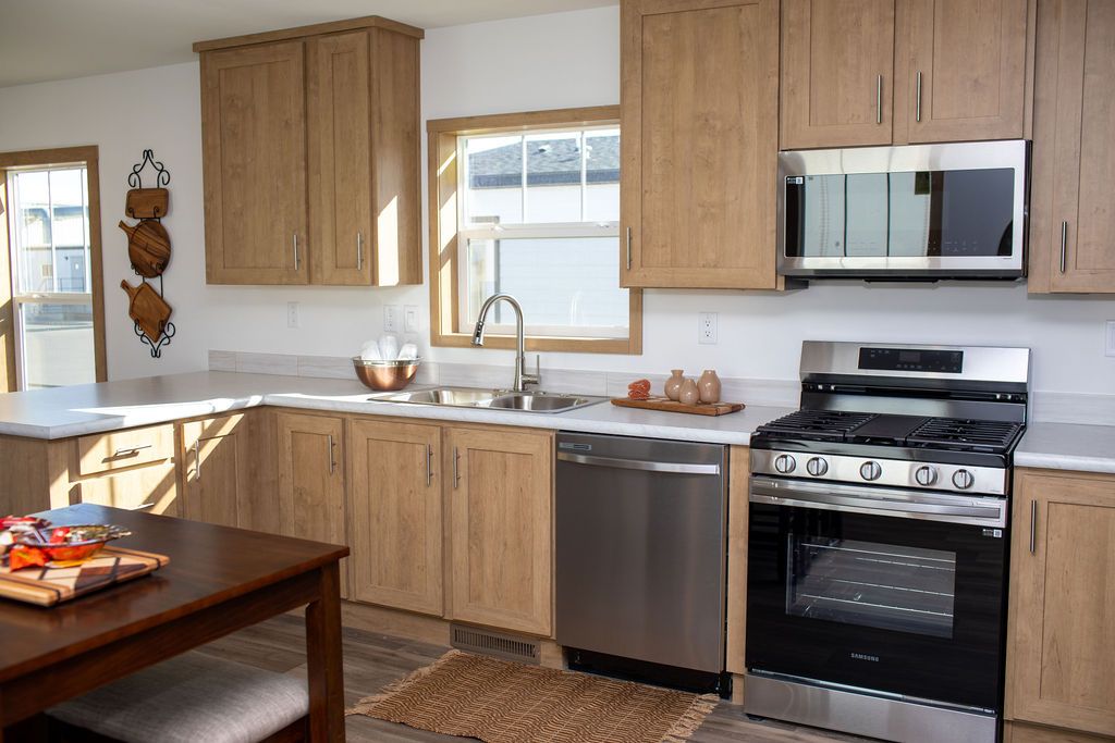 The RAMSEY 223 Kitchen. This Manufactured Mobile Home features 3 bedrooms and 2 baths.