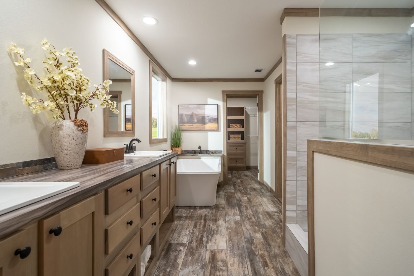 The BOUJEE PREMIER Primary Bathroom. This Manufactured Mobile Home features 4 bedrooms and 2 baths.