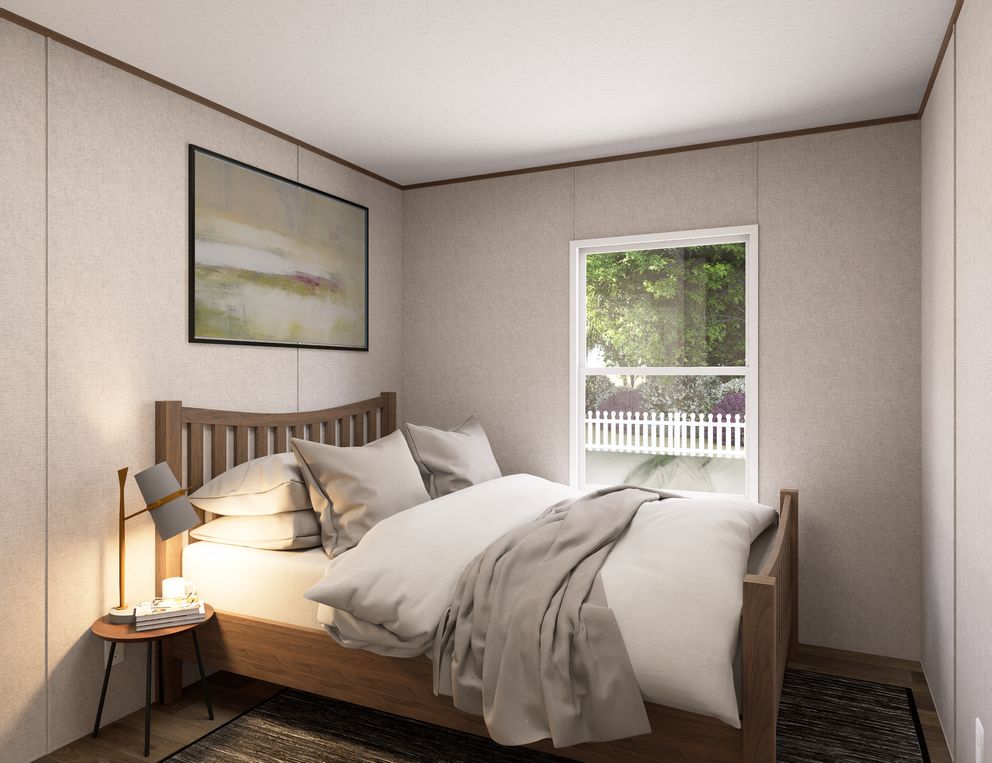 The OAK Guest Bedroom. This Manufactured Mobile Home features 4 bedrooms and 2 baths.