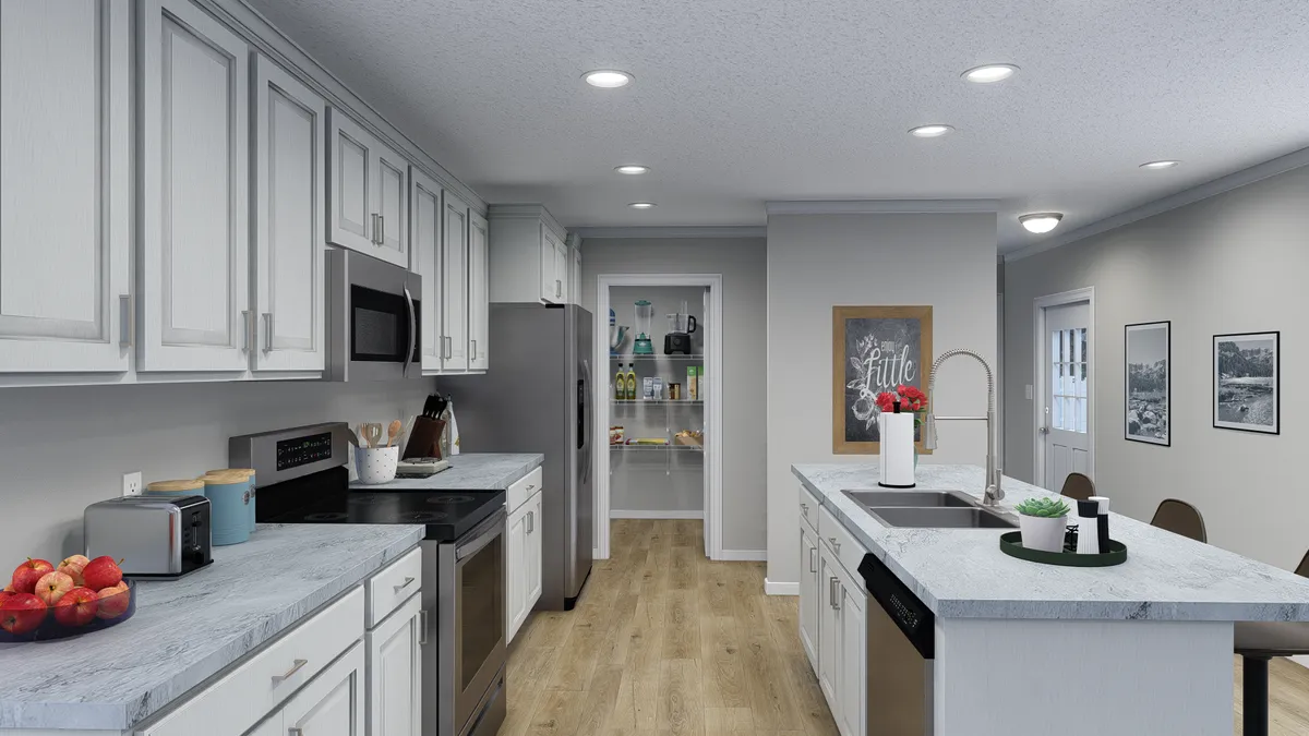 The THE WAVERLY Kitchen. This Manufactured Mobile Home features 3 bedrooms and 2 baths.