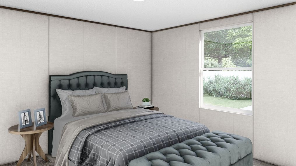 The PRIDE Guest Bedroom. This Manufactured Mobile Home features 4 bedrooms and 2 baths.