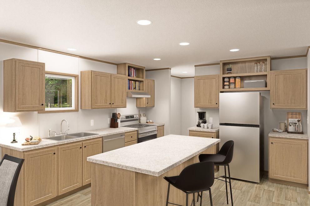 The THE EAGLE 60 Kitchen. This Manufactured Mobile Home features 3 bedrooms and 2 baths.
