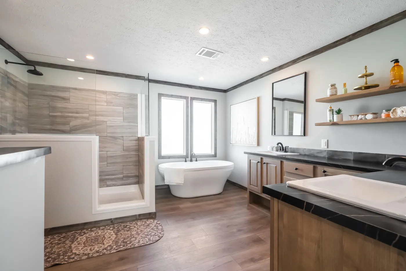 The THE JACKSON Primary Bathroom. This Manufactured Mobile Home features 4 bedrooms and 2 baths.