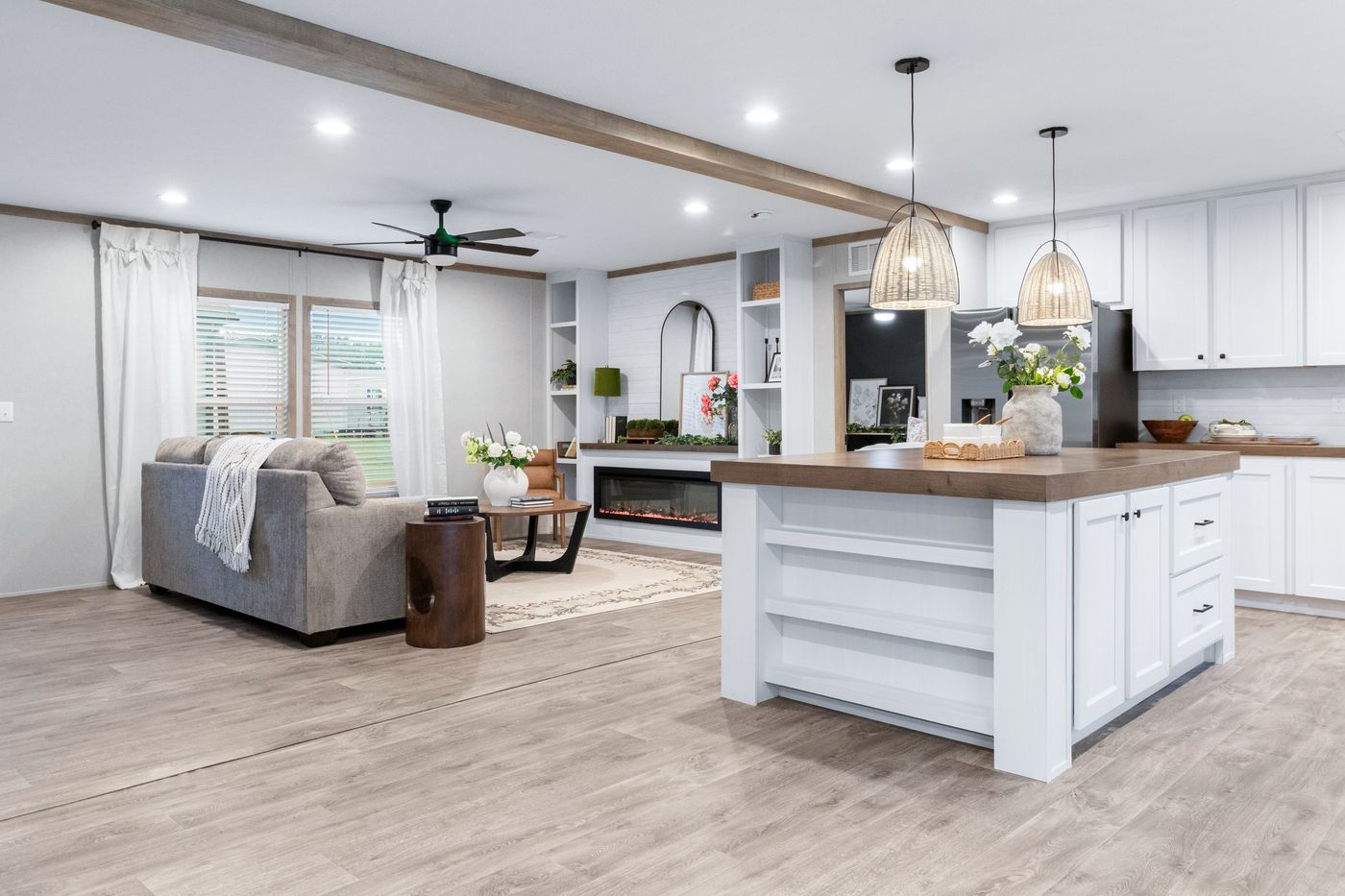 The EL SUENO BREEZE Living Room. This Manufactured Mobile Home features 4 bedrooms and 2 baths.