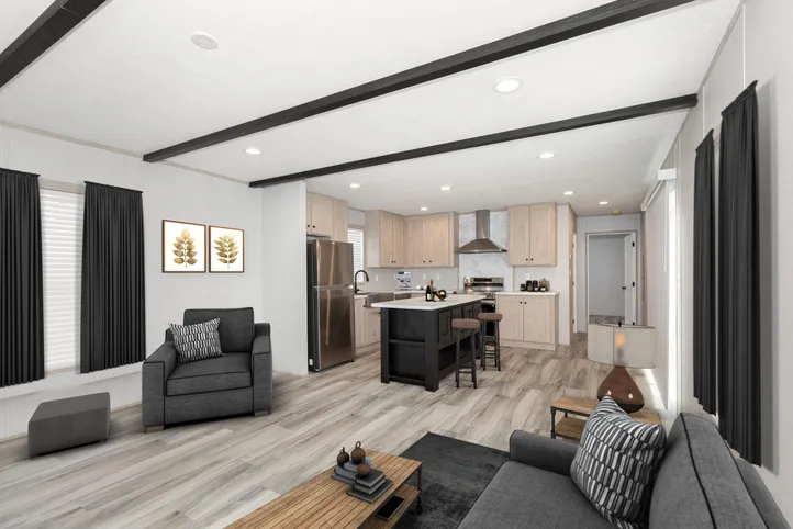 The THE ANNIVERSARY ISLANDER Living Room. This Manufactured Mobile Home features 3 bedrooms and 2 baths.