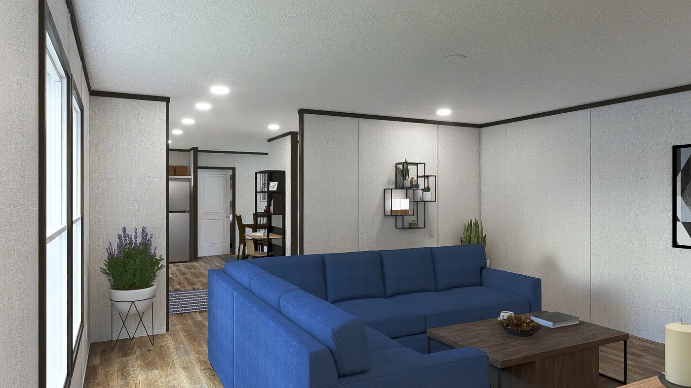 The GRAND Living Room. This Manufactured Mobile Home features 3 bedrooms and 2 baths.