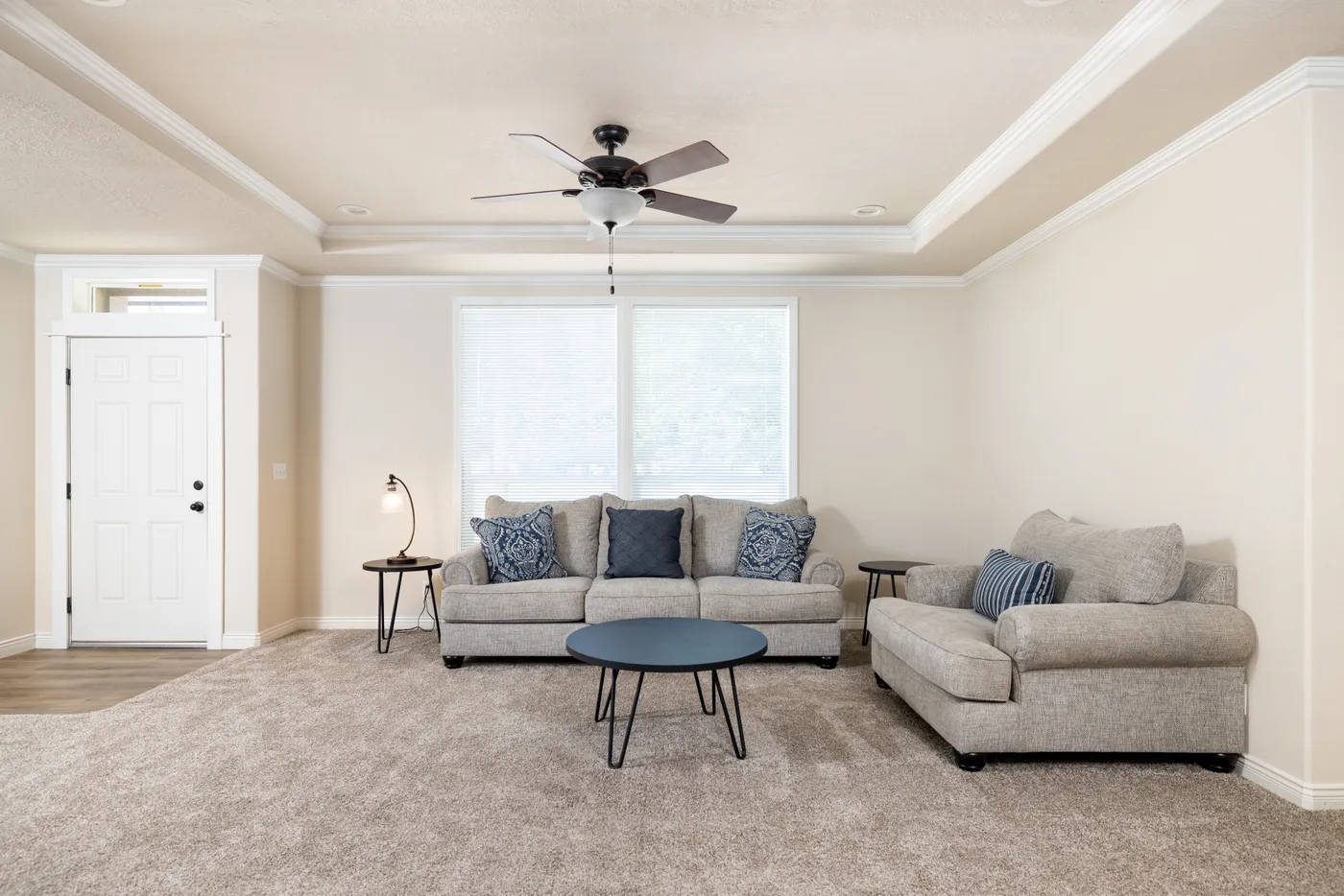 The TH601F                 CLAYTON Living Room. This Manufactured Mobile Home features 3 bedrooms and 2 baths.