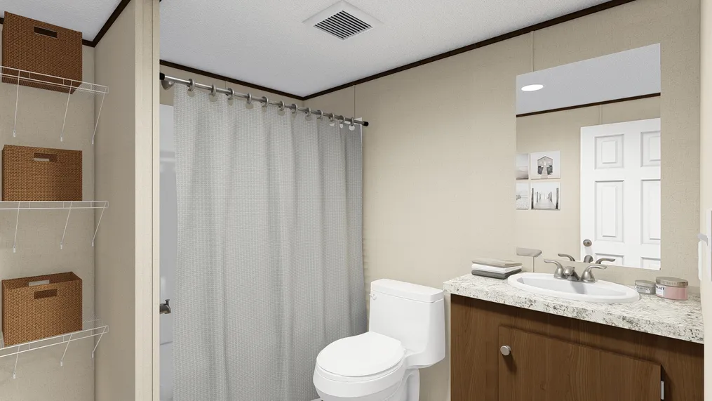 The WONDER Guest Bathroom. This Manufactured Mobile Home features 4 bedrooms and 2 baths.
